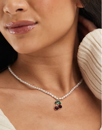 pearl beaded necklace with cherry pendant in white