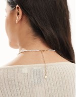 pearl beaded necklace with cherry pendant in white