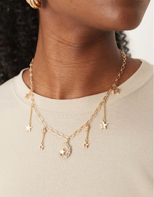 celestial multicharm necklace in gold