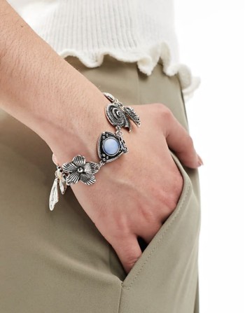Limited Edition charm bracelet with faux stone detail in silver tone
