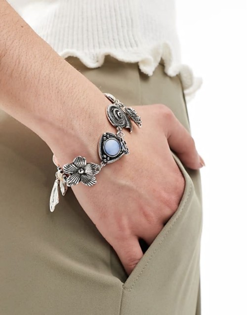 Limited Edition charm bracelet with faux stone detail in silver tone