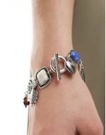 Limited Edition charm bracelet with faux stone detail in silver tone
