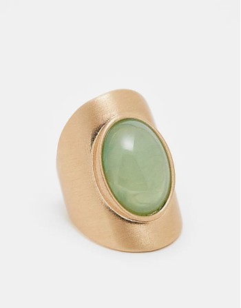 long ring with faux sage stone set in brushed gold