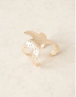 cuff bracelet with starfish detail in gold tone